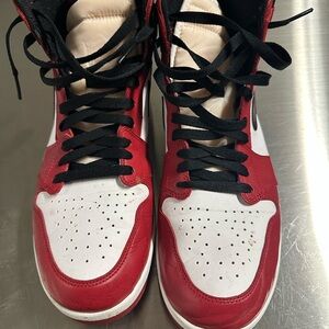 Air Jordan 1 High sneakers in the iconic red, white, and black